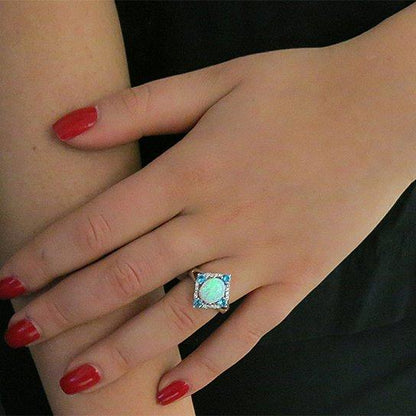 Aquamarine Opal Ring Set in 18K White Gold