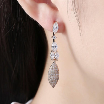 Crystal Micro-Pav'e Dangling Pear Shaped Earrings Set in 18K Gold