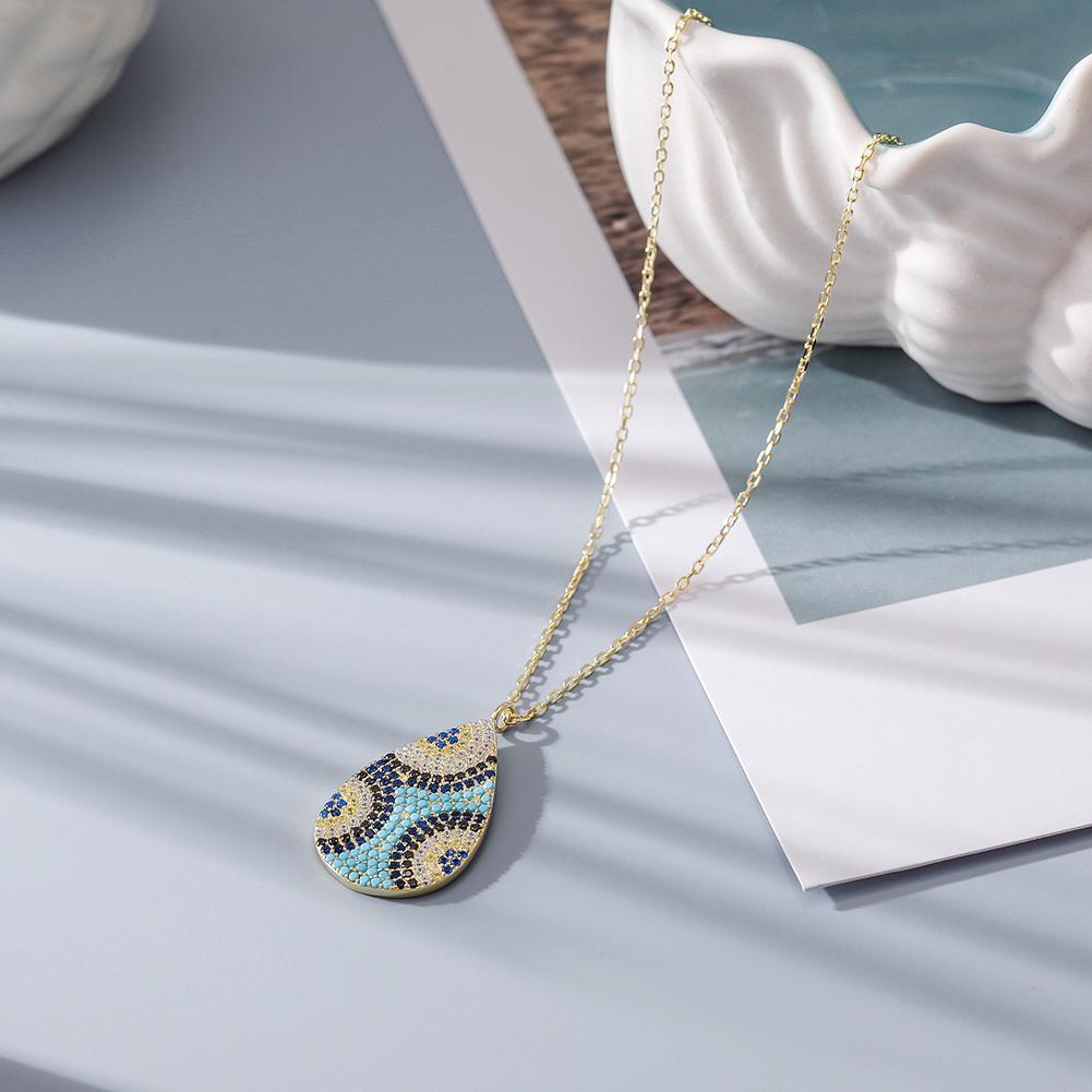 IRREGULAR EVIL EYE PENDANT