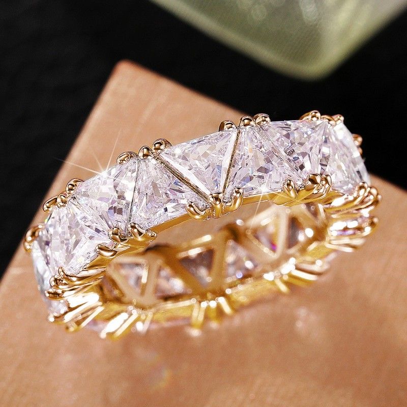 Triangular crystal ring